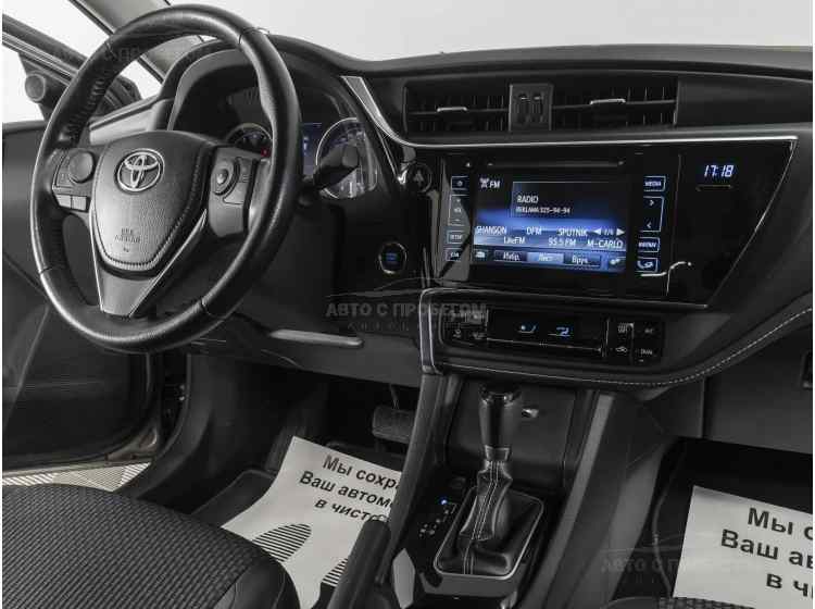 Toyota Corolla XI (E160, E170) Рестайлинг